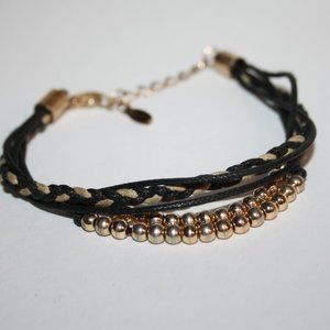 Beautiful gold and black bracelet 7-8.5" long